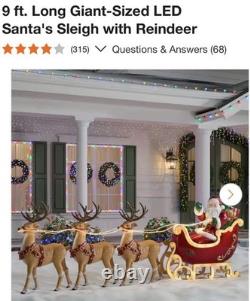 Home Accents Holiday 9ft LED Lighted Santa Sleigh & Reindeer Red Decor