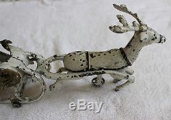 Hubley (1895- 1925) cast iron Santa in sleigh pulled by one reindeer