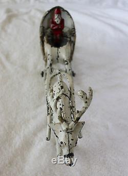 Hubley (1895- 1925) cast iron Santa in sleigh pulled by one reindeer