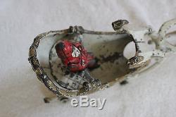 Hubley (1895- 1925) cast iron Santa in sleigh pulled by one reindeer