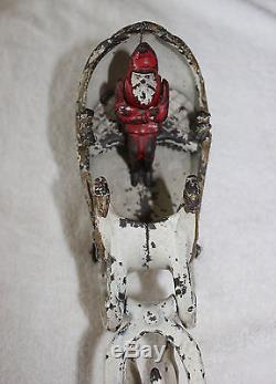 Hubley (1895- 1925) cast iron Santa in sleigh pulled by one reindeer