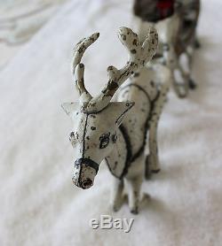 Hubley (1895- 1925) cast iron Santa in sleigh pulled by one reindeer