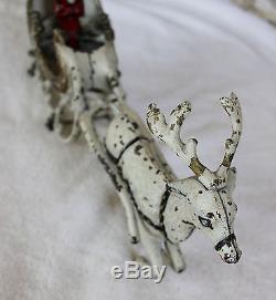 Hubley (1895- 1925) cast iron Santa in sleigh pulled by one reindeer
