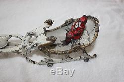 Hubley (1895- 1925) cast iron Santa in sleigh pulled by one reindeer