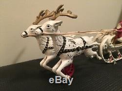 Hubley Toys Cast Iron Santa, Sleigh, and 2 White Reindeer