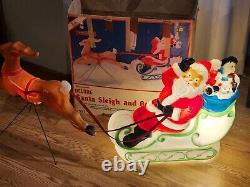 Illuminated Santa Claus sleigh and Reindeer blow mold