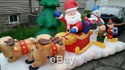 Inflatable santa sleigh elves tree reindeer lights music christmas presents lawn