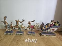 Jim Shore Delivering Joy Santa Sleigh And the 3 Dash Away Reindeer Figurines