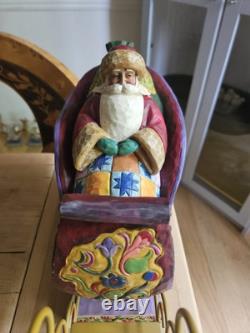 Jim Shore Delivering Joy Santa Sleigh And the 3 Dash Away Reindeer Figurines
