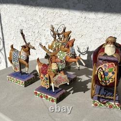 Jim Shore Delivering Joy Santa Sleigh And the 8 Dash Away Reindeer Figurines