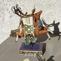 Jim Shore Delivering Joy Santa Sleigh And the 8 Dash Away Reindeer Figurines