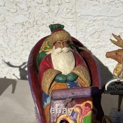 Jim Shore Delivering Joy Santa Sleigh And the 8 Dash Away Reindeer Figurines