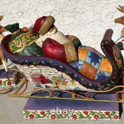 Jim Shore Delivering Joy Santa Sleigh And the 8 Dash Away Reindeer Figurines