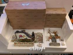 Jim Shore Santa Sleigh Delivering Joy & the One Dash Away Reindeer With Boxes