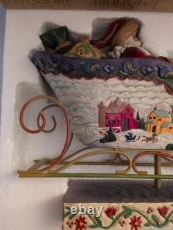 Jim Shore Santa Sleigh Delivering Joy & the One Dash Away Reindeer With Boxes