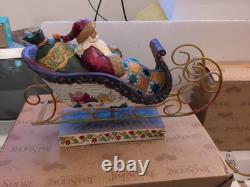 Jim Shore Santa Sleigh Delivering Joy & the One Dash Away Reindeer With Boxes