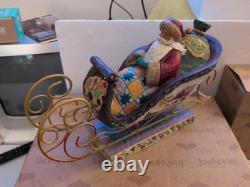Jim Shore Santa Sleigh Delivering Joy & the One Dash Away Reindeer With Boxes