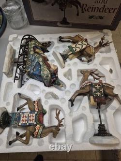 Kirkland Signature Santa Sleigh and Reindeer Christmas 9.5 Figurines- Set of 4