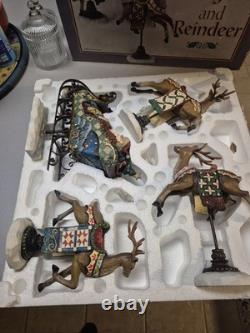 Kirkland Signature Santa Sleigh and Reindeer Christmas 9.5 Figurines- Set of 4