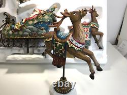 Kirkland Signature Santa Sleigh and Reindeer Christmas 9.5 Figurines- Set of 4