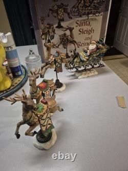 Kirkland Signature Santa Sleigh and Reindeer Christmas 9.5 Figurines- Set of 4