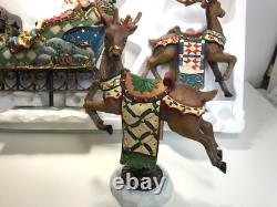 Kirkland Signature Santa Sleigh and Reindeer Christmas 9.5 Figurines- Set of 4