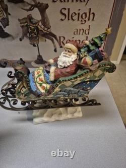 Kirkland Signature Santa Sleigh and Reindeer Christmas 9.5 Figurines- Set of 4