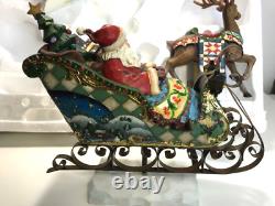 Kirkland Signature Santa Sleigh and Reindeer Christmas 9.5 Figurines- Set of 4