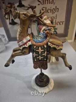 Kirkland Signature Santa Sleigh and Reindeer Christmas 9.5 Figurines- Set of 4