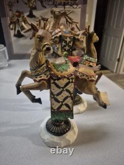 Kirkland Signature Santa Sleigh and Reindeer Christmas 9.5 Figurines- Set of 4