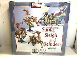 Kirkland Signature Santa Sleigh and Reindeer Christmas 9.5 Figurines- Set of 4