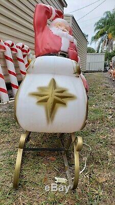 Light up blow mold Santa on sleigh with 7 reindeer