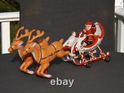 Mechanical Cast Iron Santa Sled & Reindeer on Wheels Reindeer Go Up & Down