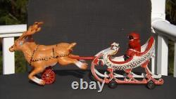 Mechanical Cast Iron Santa Sled & Reindeer on Wheels Reindeer Go Up & Down