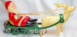 Mechanical Celluloid Santa on Sleigh Bell with Reindeer WORKS