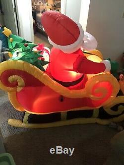NEW Gemmy Christmas Airblown Inflatable Animated Santa And Reindeer In Sleigh