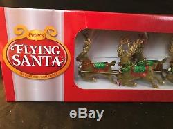 NIB Peter`s Flying Santa Claus Sleigh & Reindeer Moving Tree Topper Ornament