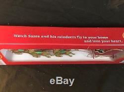 NIB Peter`s Flying Santa Claus Sleigh & Reindeer Moving Tree Topper Ornament