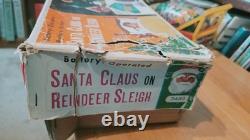 NICE 1950's MODERN TOYS BATTERY OPERATED SANTA CLAUS ON REINDEER SLEIGH With BOX