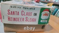 NICE 1950's MODERN TOYS BATTERY OPERATED SANTA CLAUS ON REINDEER SLEIGH With BOX