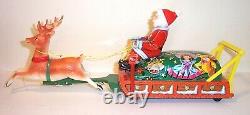 NICE 1950's SANTA CLAUS ON REINDEER SLEIGH BATTERY OPERATED TIN CHRISTMAS TOY