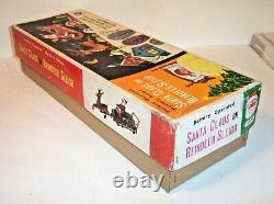 NICE 1950's SANTA CLAUS ON REINDEER SLEIGH BATTERY OPERATED TIN CHRISTMAS TOY
