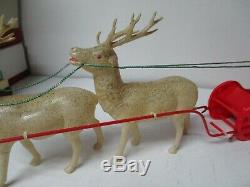 Old 1920's Celluloid Santa in Sled with 2 Glass Eye Celluloid Reindeer 17 x 6