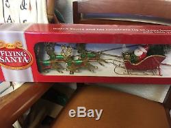 Peter`s Flying Santa Claus Sleigh & Reindeer Moving Tree Topper Ornament