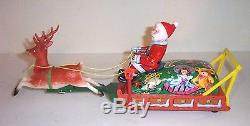 RARE MIB 1950s SANTA CLAUS ON REINDEER SLEIGH BATTERY OPERATED TIN LITHO MINT