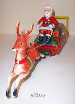 RARE MIB 1950s SANTA CLAUS ON REINDEER SLEIGH BATTERY OPERATED TIN LITHO MINT