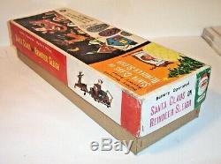 RARE MIB 1950s SANTA CLAUS ON REINDEER SLEIGH BATTERY OPERATED TIN LITHO MINT