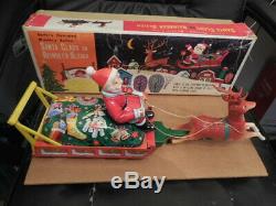 Rare 1950s Santa Claus and Reindeer Sleigh Tin Battery Op Modern Toys Japan Box
