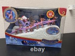 Rudolph The Red-Nosed Reindeer Santa's Musical Sleigh Santa Sleigh And Reindeers