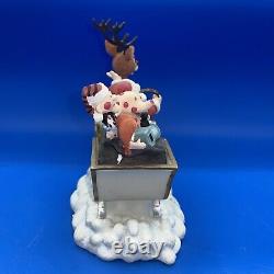 Rudolph the Red Nosed Reindeer Rudolph and Santa's Sleigh Deluxe Figurine